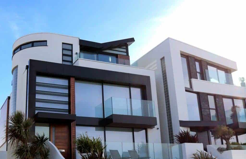 A modern house with balconies and a pool, managed by a San Francisco Bay Area property management company.