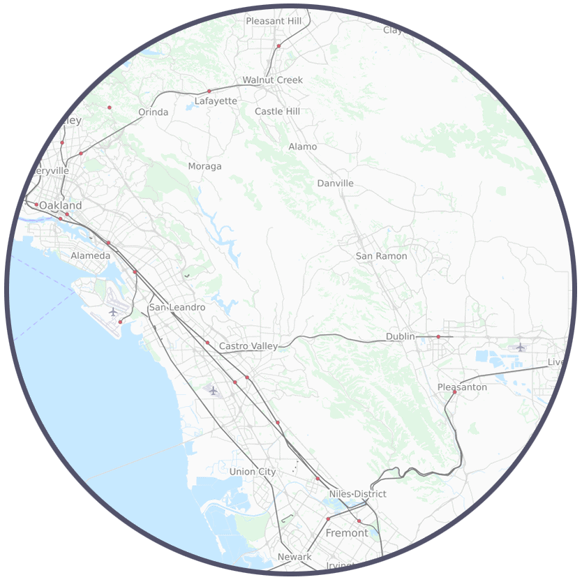 A circular map of California highlighting the San Francisco Bay Area region and property management in San Leandro.